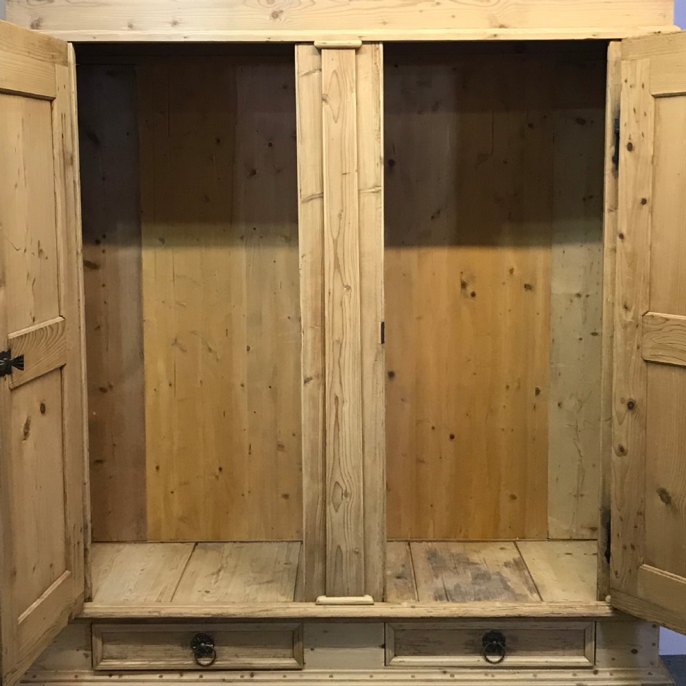 A VERY GRAND OLD PINE GERMAN WARDROBE (DISMANTLES) View VII
