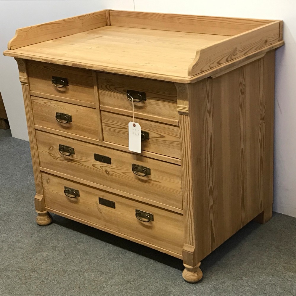 ANTIQUE PINE BANK OF DRAWERS WITH CUPBOARD View III