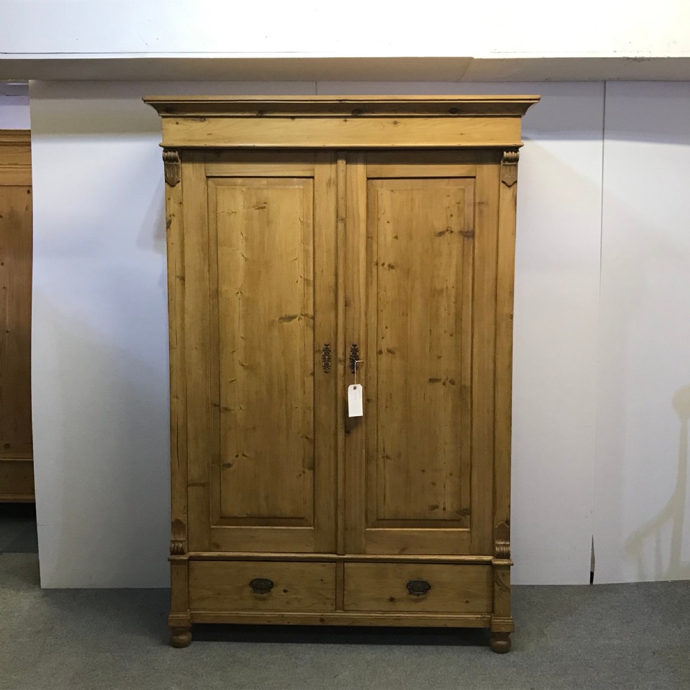WAXED ANTIQUE PINE DOUBLE WARDROBE (DISMANTLES)