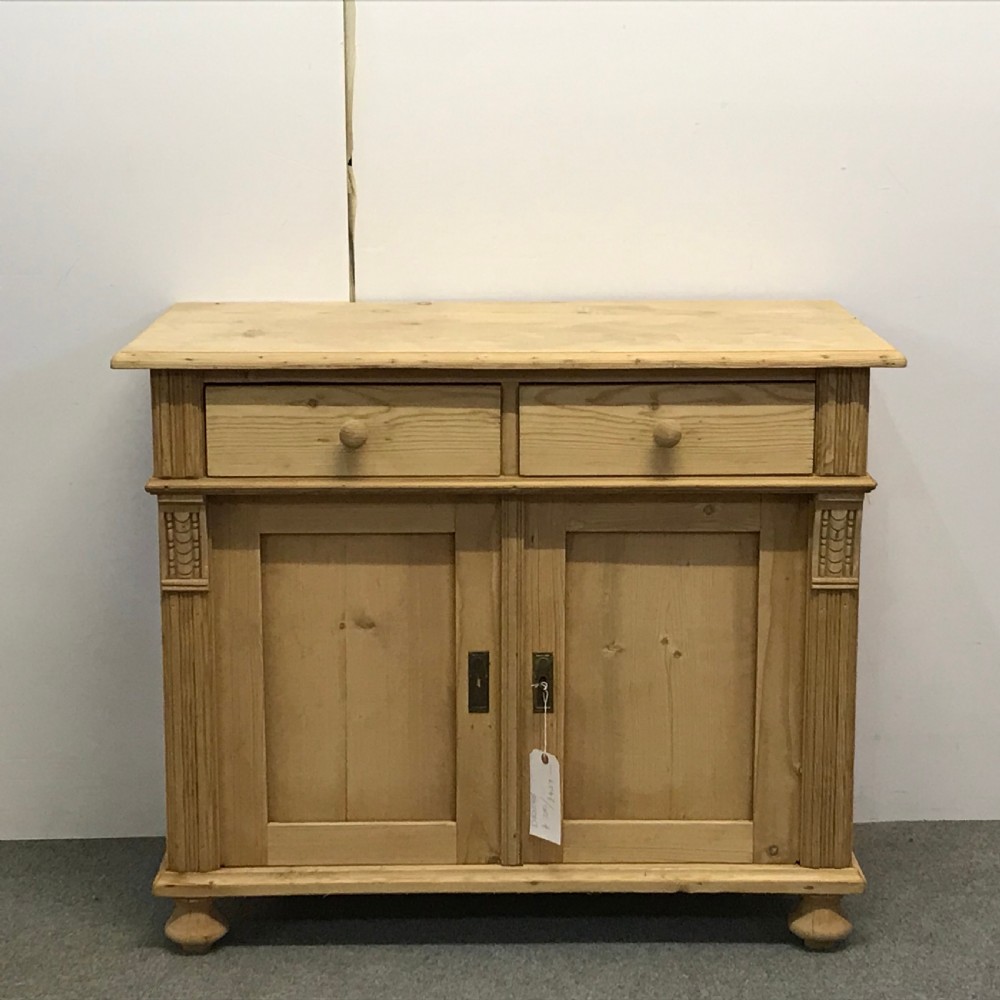 SMALL ANTIQUE PINE CUPBOARD WITH 2 DRAWERS