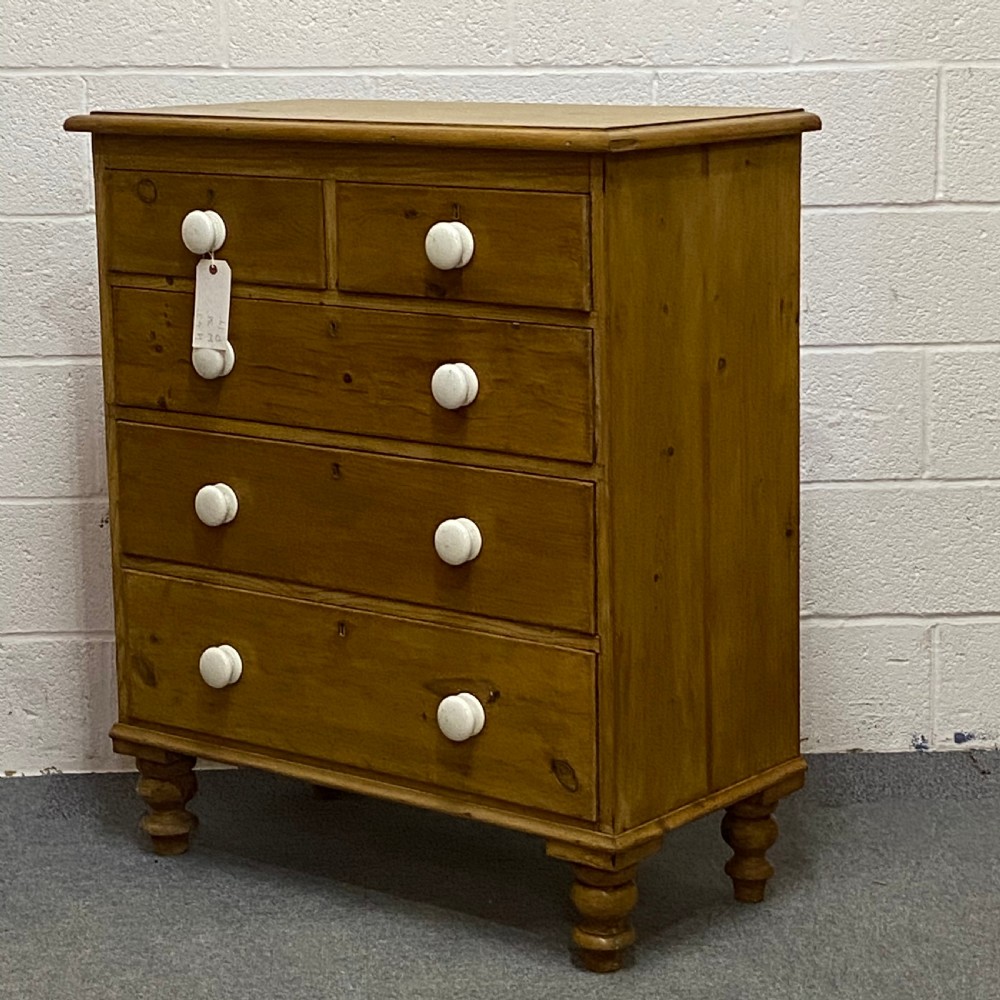 A WAXED ENGLISH VICTORIAN PINE CHEST OF DRAWERS View III