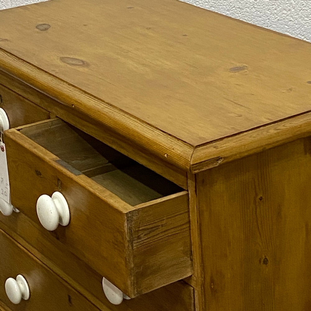 A WAXED ENGLISH VICTORIAN PINE CHEST OF DRAWERS View IV