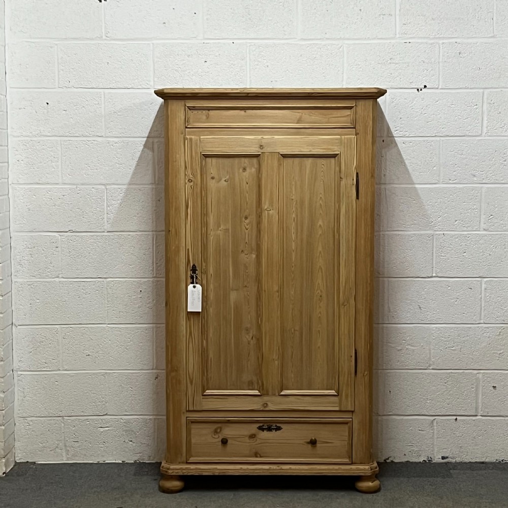 SLENDER ANTIQUE DANISH PINE SINGLE DOOR CUPBOARD