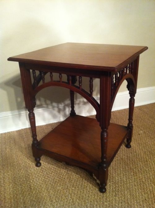 An Aesthetic Movement Walnut Two Tier Table of Unusual Form C1880. 

An Aesthetic Movement Walnut Two Tier Table of Unusual Form C1880