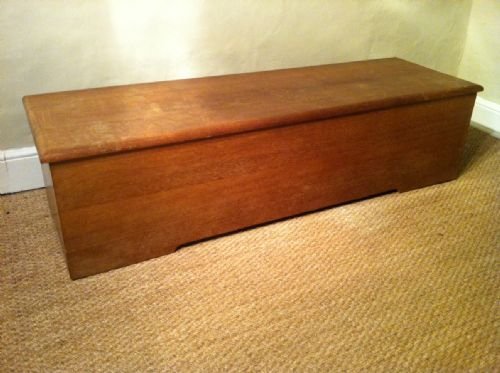 A Pair of Anglo Indian Teak Trunks or Ottomans C1930. One Illustrated

