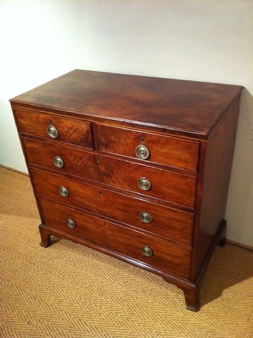 A George III Mahogany and Boxwood Strung Chest of Drawers C1810. 

