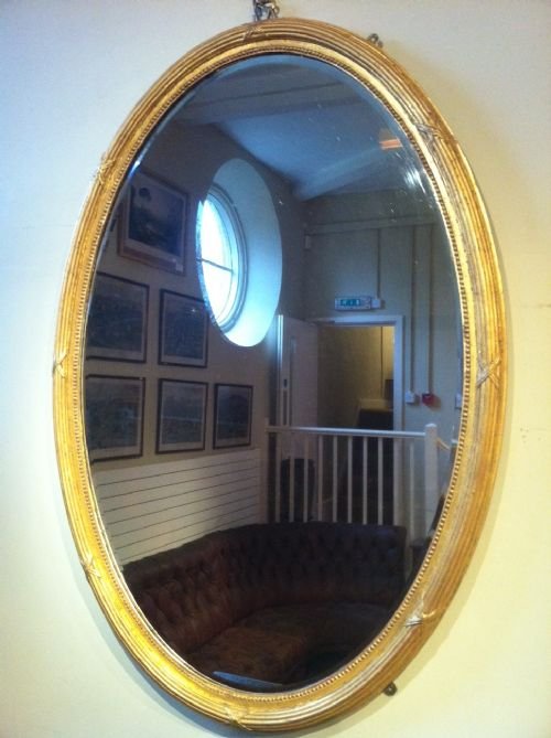 A Large Late Victorian Oval Mirror C1890
