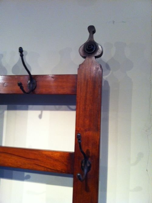 fig 1. A large Victorian mahogany iron and brass coat and stickstand c 1870