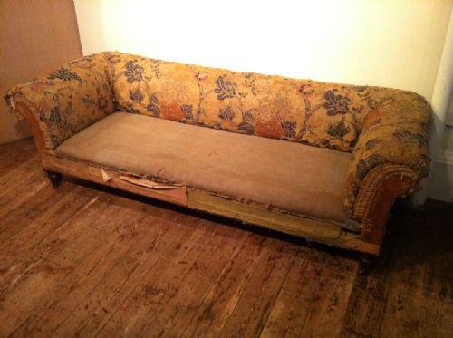 A  Large Victorian 3 Seater Sofa C 1890 on 4 Turned Fluted Mahogany Legs the Back and Sides with the Original Brocaded Arts and Crafts Fabric  

