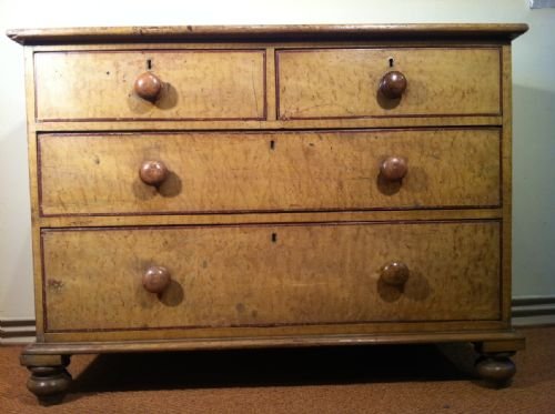 fig 1. A mid 19th c North Country chest of 2 short and 3 long drawers with the original simulated maple painted decoration.