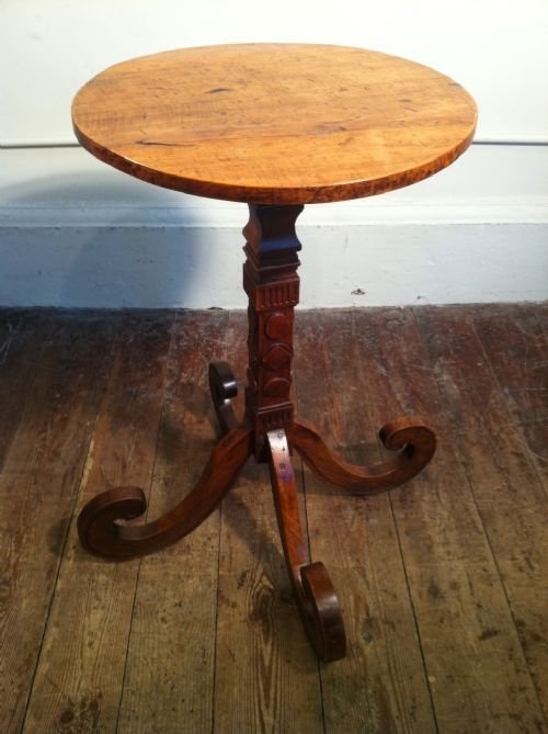 A Rare Franco Swiss Fruitwood Circular Table . Mid 19th C with Exaggerated Scrolled Feet .