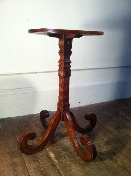 fig 1.  A rare Franco Swiss fruitwood circular table . Mid 19th c with exaggerated scrolled feet .