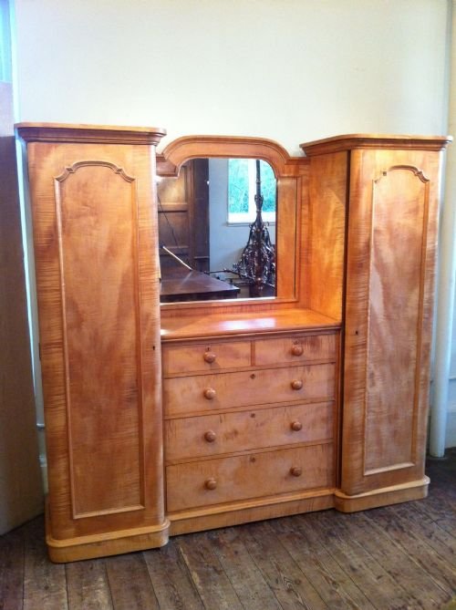 A Victorian Satin Birch and Birds Eye Maple Breakfront Wardrobe C 1870