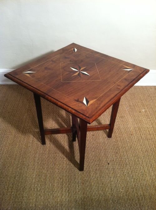 An African Wenge or Teak Inlaid Table C1930