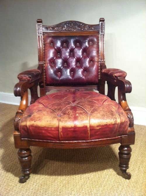 fig 1. A Victorian walnut and leather library chair c1880