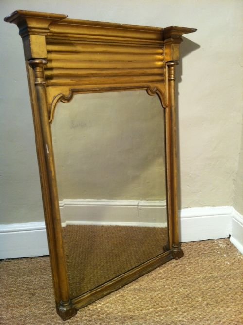 fig 1. A Regency gilt pier mirror c1830 fitted aroung an early 18th c bevelled mirror plate