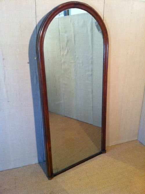 A Victorian Arched Oak Mirror C1870