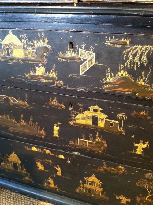fig 1. A George 111 chinoiserie lacquer cabinet on chest