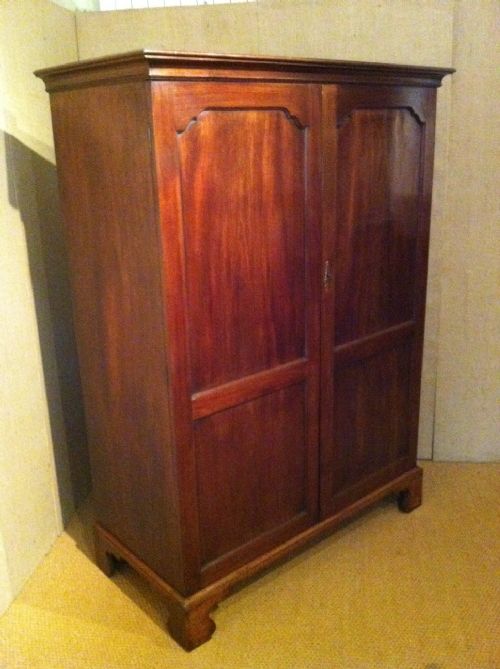 A George 111 Mahogany Panelled Fonted Wardrobe C 1790