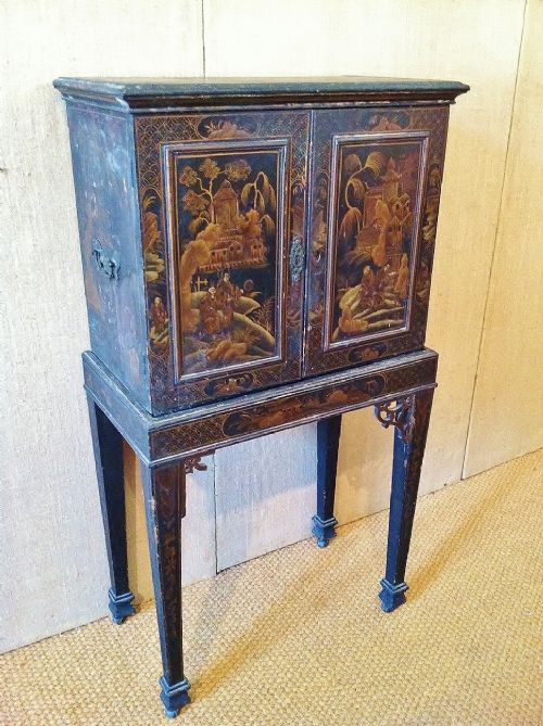 A  Regency Chinoiserie Lacquer and Gilt Cabinet on Stand C 1820