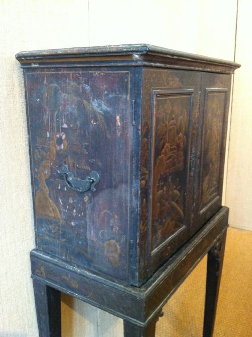 fig 2. A Regency chinoiserie lacquer and gilt cabinet on stand c 1820