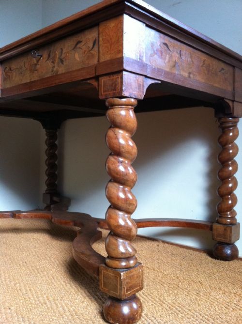fig 1. A Victorian walnut and marquetry writing table c 1860