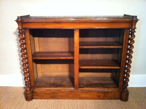 fig 1. A Victorian walnut open bookcase c1860