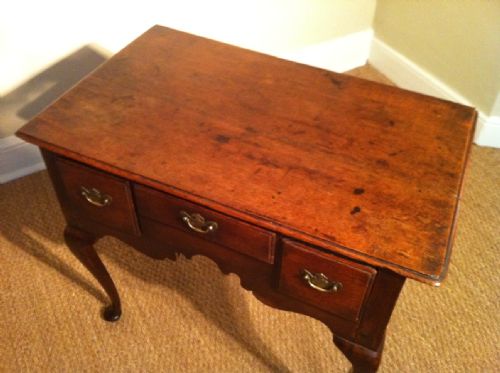 fig 1. An early George 111 oak lowboy c 1760