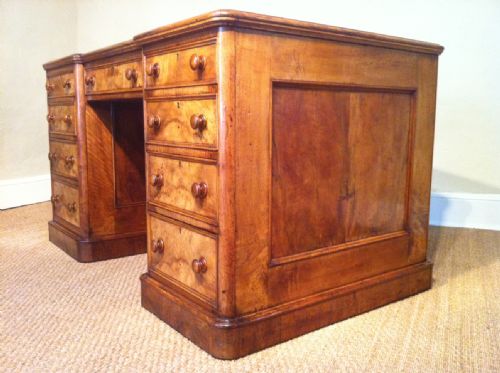 fig 2. A Victorian figured walnut freestanding pedestal desk c 1870
