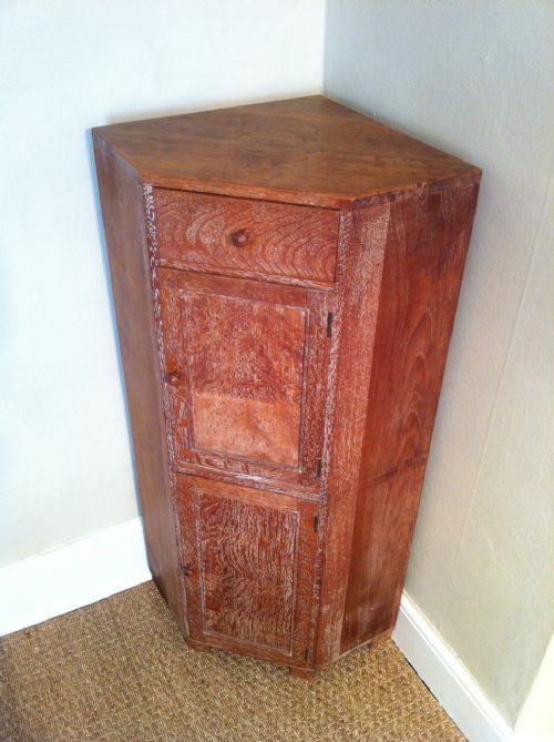 fig 1. A Heals oak corner cupboard c 1935
