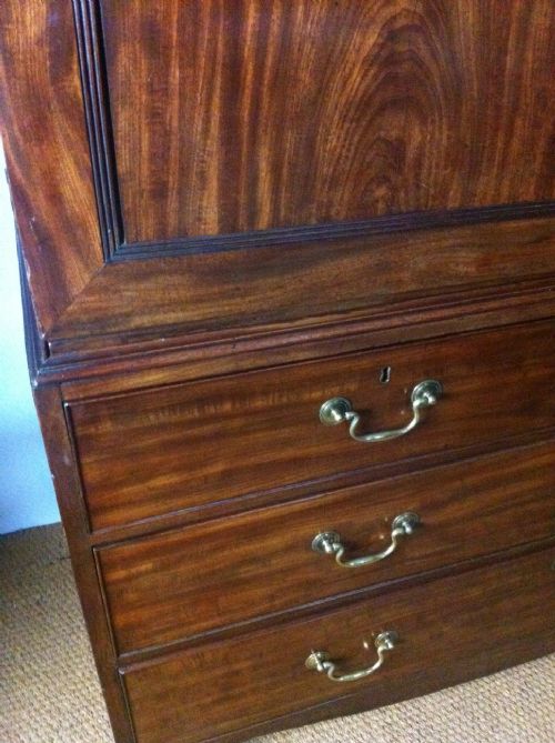 fig 1. A Regency mahogany linen press c 1810