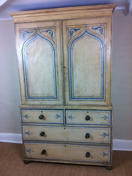 fig 1. A George IV painted Gothic linen press c 1830