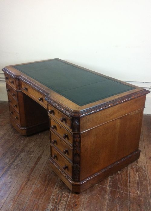 fig 1. A Victorian oak pedestal desk c 1865