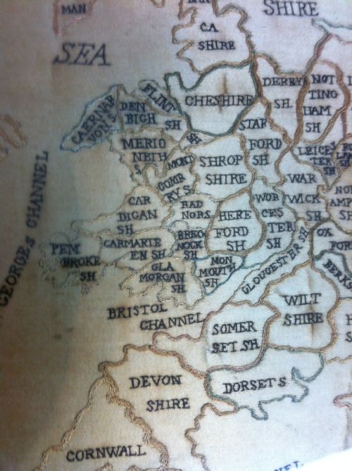 fig 1. A George 111 oval silkwork map of England and Wales c 1810