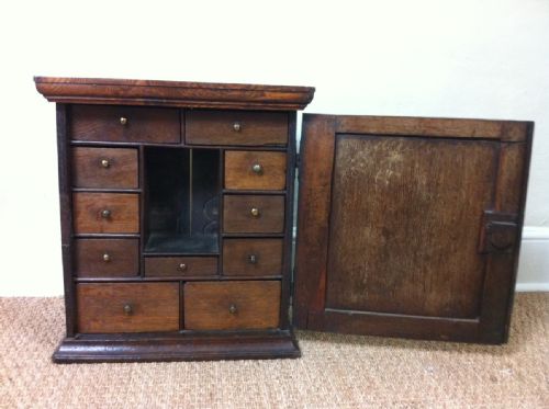 An Early Georgian Oak Spice Cabinet C 1740
