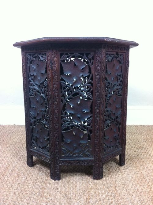 An Indian Carved Octagonal Table. Bombay Late 19th C