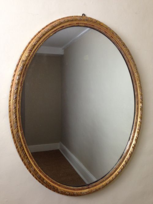 A Large Victorian Oval Water Gilt Mirror C 1860