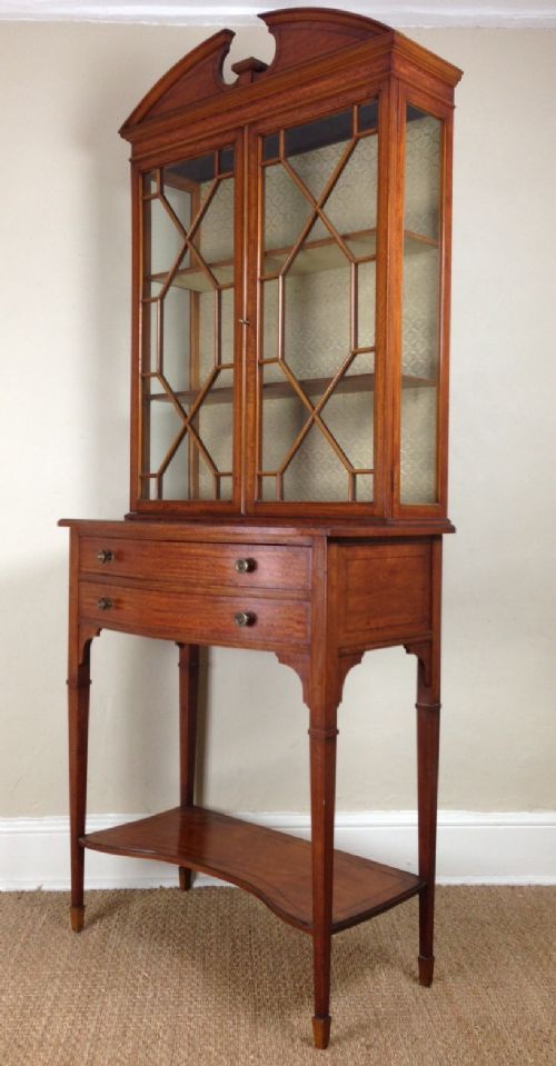 An Edwardian Satinwood and Inlaid Display Cabinet by Maples C 1910