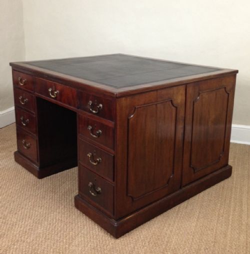 A George 111 Mahogany Partners Desk Dated 1782
