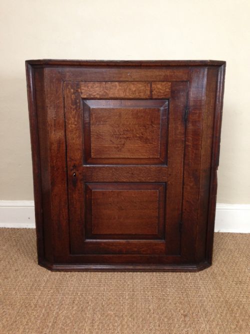 A Georgian Oak Corner Cupboard C1800