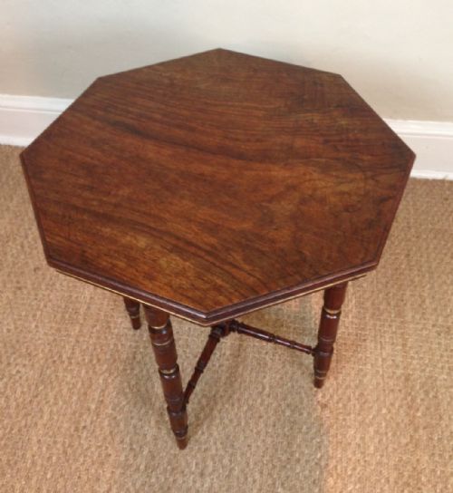 A Victorian Walnut and Parcel Gilt Octagonal Table C 1880