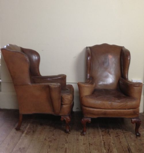 fig 1. A pair of Edwardian walnut and leather wing chairs c 1910