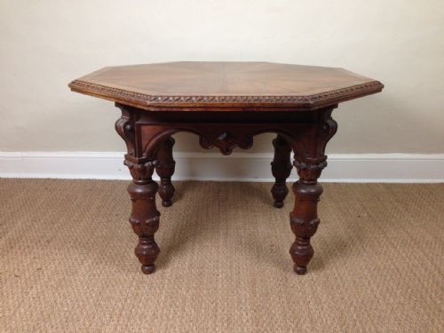 fig 1. An Elizabethan revival burr oak octagonal library table c 1865