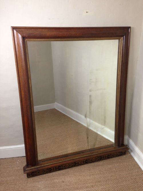 A Victorian Oak and Parcel Gilt Overmantel Mirror C 1870