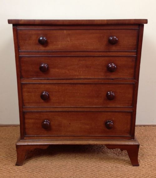 fig 1. A late George 111 mahogany commode chest c 1800