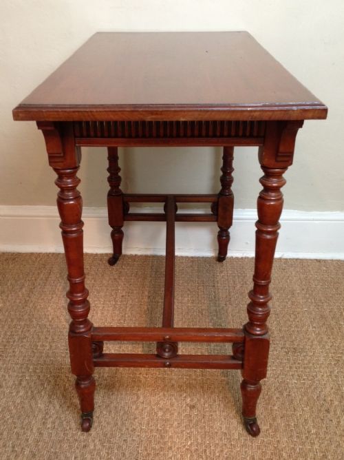 fig 1. An Aesthetic movement walnut table by James Shoolbred c 1890