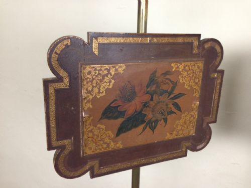 fig 1. A pair of Regency rosewood and painted pole screens dated 1820