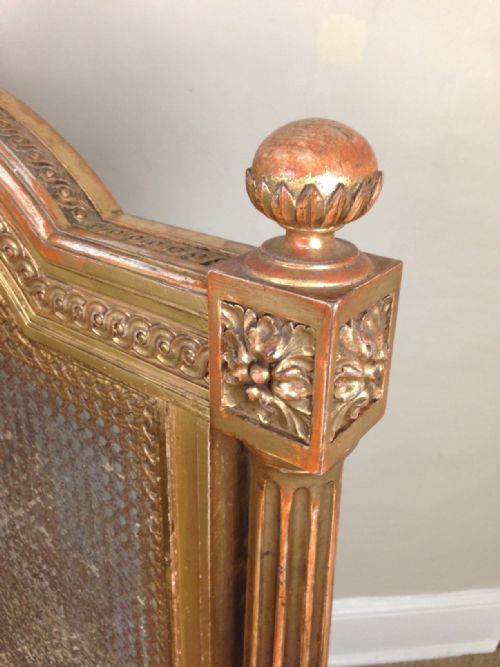 fig 1. A Victorian gilt wood and caned bed c 1870
