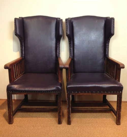fig 1. A Pair of Arts and Crafts oak and rexine wing chairs c 1910 