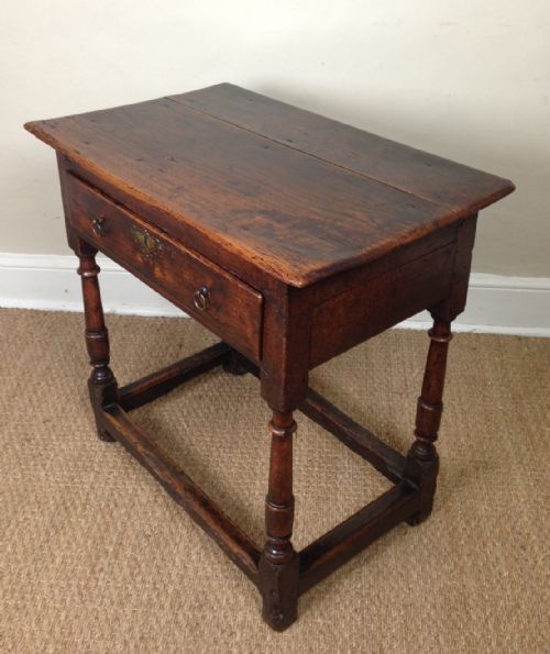 A Queen Anne Elm and Walnut Side Table C 1710
